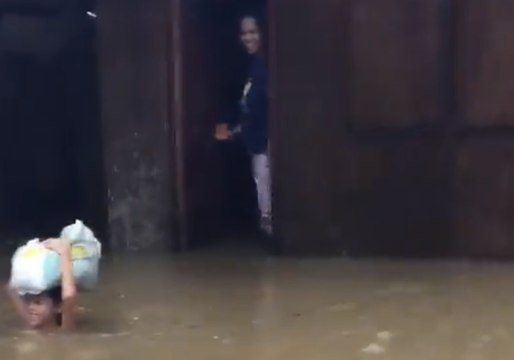 Rainfall Blocks Roads and Floods Homes as Storm Hits Philippines