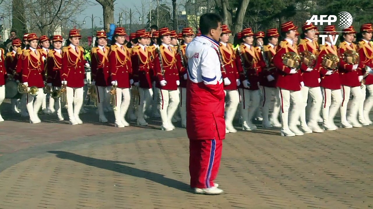 North Korean cheerleaders perform at historical house