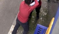 Sokak ortasında genç kadını boğmaya çalıştı
