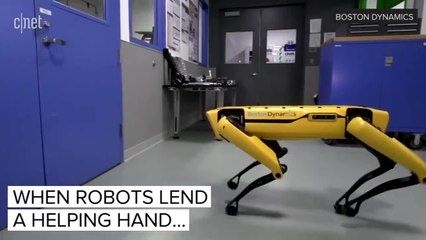 Boston Dynamics robot opens door