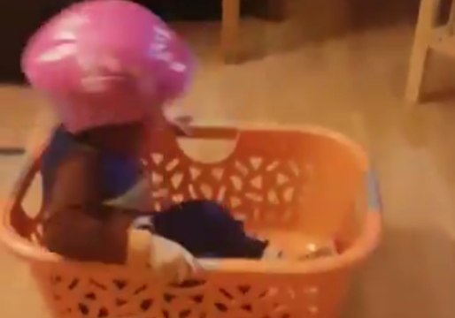 Innovative Three-Year-Old Recreates the Luge With Laundry Basket
