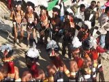 Chang tribals dancing in their morung.