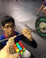 Guy Solves 3D Puzzle Cube While Doing Squats