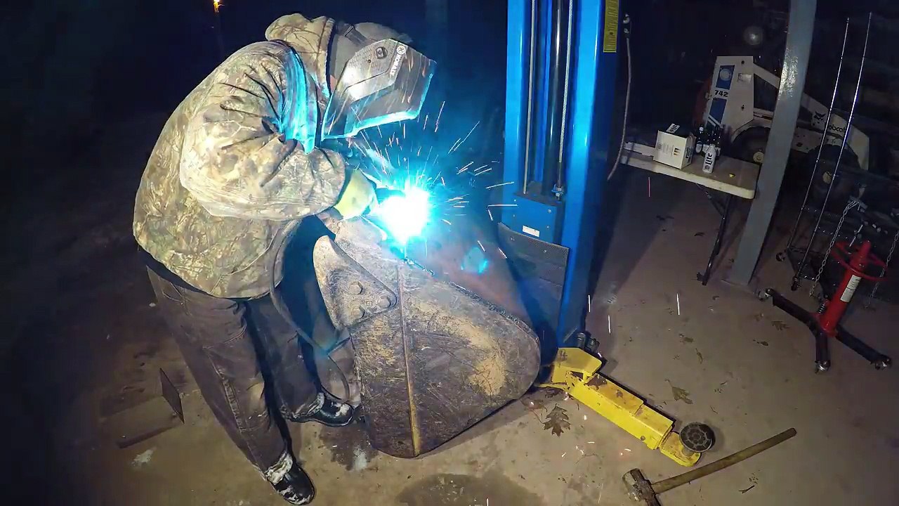 Welding an excavator bucket