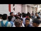 Heavy crowd gather outside bike showroom in Kanpur