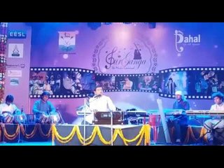 Artist singing sufi songs and bhajan