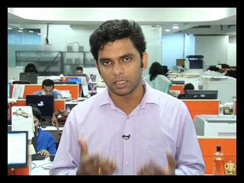 Rupee closes at a record low of 64.04