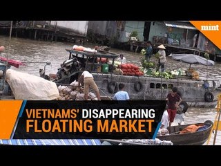 Vietnam floating market struggles to stay above water