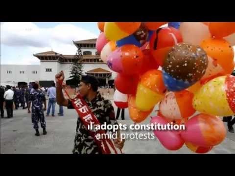 Nepal adopts constitution amid protests