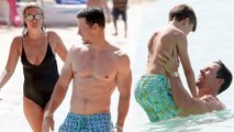 Life's a beach! Mark Wahlberg and model wife Rhea Durham show off their impressive physiques as they enjoy Barbados getaway.
