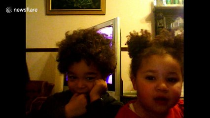 Two-year-old laughs adorably after getting cousin told off