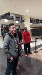 Two kids dressed as a tall man to get into “Black Panther” is caught on video