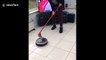 UK mum tries her hand at curling with a Roomba and the broom