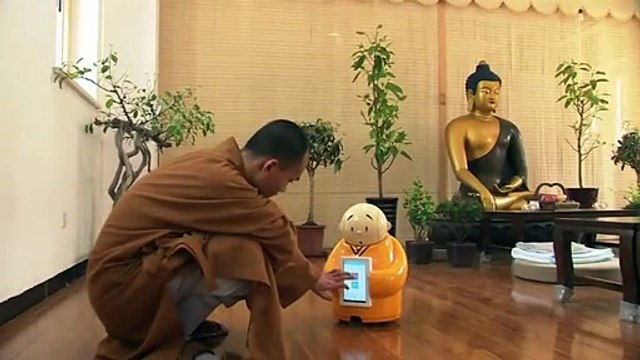 Monjes budistas robot una nueva era ha comenzado