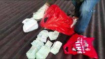 Jandarmaya yakalanmamak için sahte paraları çatıya attılar