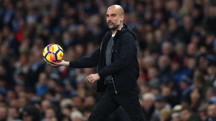 Man City's Guardiola still loving life in England
