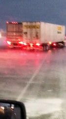 Wind Whips Trailer into Passing Truck