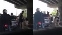 Three men held over viral road rage video