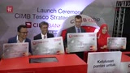 Tesco ties up with CIMB for home delivery