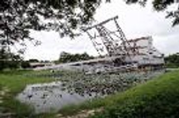Boarding the iconic tin dredge TT5 in Kinta Valley