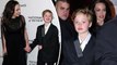 Pictured: Shiloh Jolie-Pitt shows off cast in black sling after breaking arm as well as new braces as she joins mom Angelina Jolie at awards show.