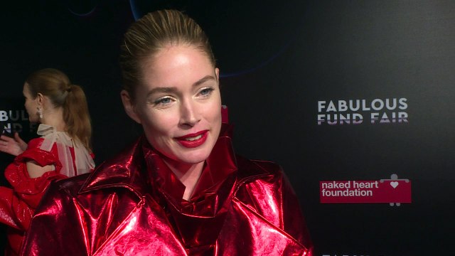Former Victoria's Secret model Doutzen Kroes kisses for £500