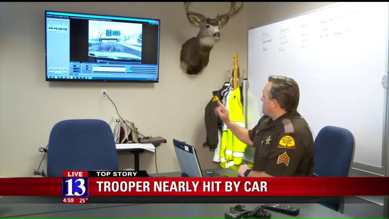 Video Shows Trooper Nearly Hit by Car Sliding on Snowy Freeway