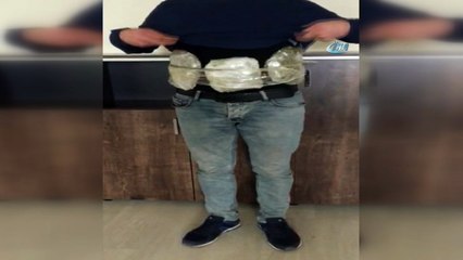 Orantısız vücut ölçüleri uyuşturucu kuryesini ele verdi