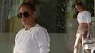 Ab-tastic! Jennifer Lopez, 48, flaunts her toned six-pack in white crop top and yoga pants as she leaves brunch in Miami.