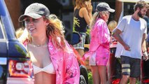 Miley Cyrus flaunts her slender figure in a bikini and tiny denim shorts as she continues Australian getaway with beau Liam Hemsworth