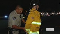 Un flic arrête un pompier qui tente de sauver des vies
