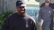 Doting dad! Kanye West can't stop smiling as he arrives for business meeting after the arrival of his third child with wife Kim Kardashian.