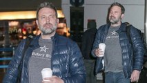 Ben Affleck carries backpack as he lands in New York City... after denying claims he's engaged to Lindsay Shookus.