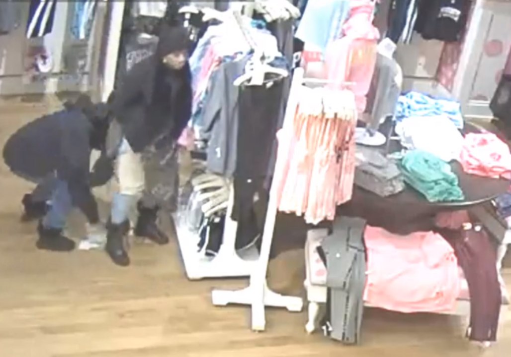 Shoplifting Suspects Stuff Clothes Between Legs...