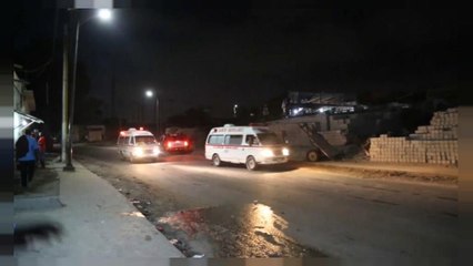 At least 18 dead and 20 injured after twin car bomb attacks in Somalia's capital Mogadishu