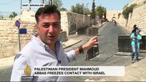 Palestinian leader freezes contact with Israel