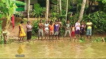 Sri Lanka struggles to deliver aid to stranded flood victims