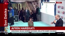 Cumhurbaşkanı Erdoğan, bordo bereli bir kız çocuğunu sahneye çağırarak alnından öptü