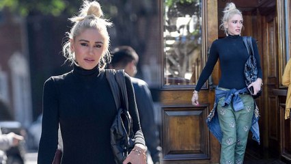 Off duty beauty! Gwen Stefani is casual chic in black bodysuit and embellished cargo pants as she steps out in Los Angeles.