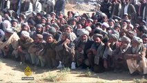 Mourners bury Afghan civilians killed in NATO bombing