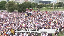 Thousands of Venezuelans take to streets in anti-government protests