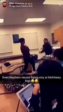 McKinney High School teacher McKinney, Texas, filming two students fighting