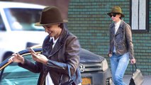 Has Jamie sent you something Foxxy? Katie Holmes giggles at the screen of her phone after pulling up in a cab to hit the shops in Manhattan.