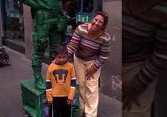 Funny Toy Story Soldier Street Performer Plays with a Kid