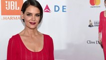 Red hot! Katie Holmes wows in fitted dress featuring sheer stripes at Clive Davis Pre-Grammy Gala.