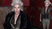 Human Ken Doll Rodrigo Alves proudly flaunts his new figure in sheer shirt as he heads for dinner in New York City... after having four ribs removed in 60th surgical procedure.