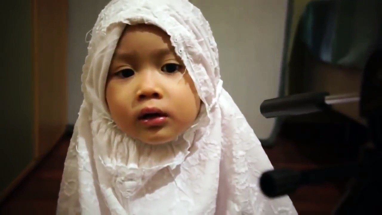 Little girl Reciting Quran