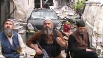 Fighting continues in Homs as UN calls on fighters to return to talks
