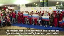 Russians give Olympic athletes a heroes' welcome home