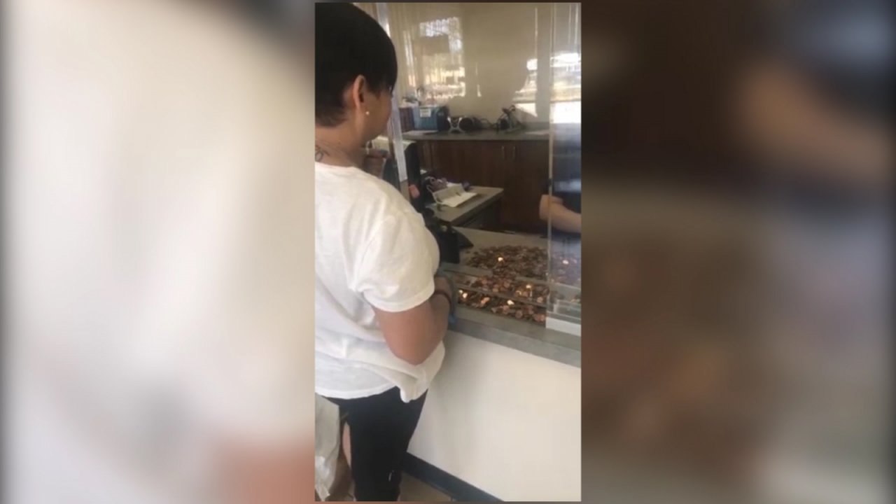 Woman pays over $400 water bill in pennies